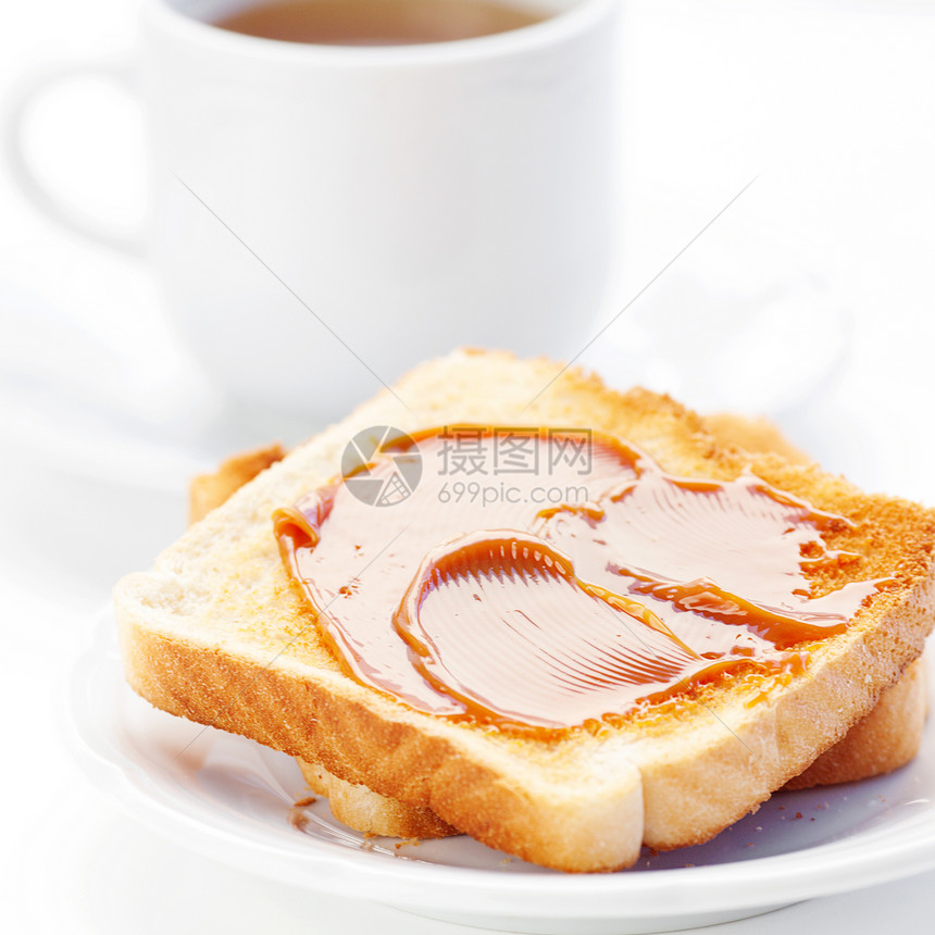 茶和吐司加焦糖 白的孤立液体甜甜圈早餐制品生活饮料动机牛奶飞碟灯光图片