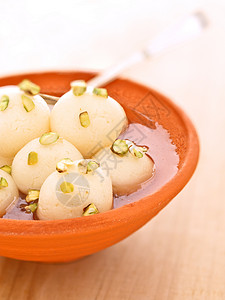 印度里拉丘拉甜点奶制品垃圾糖浆食物芝士高清图片