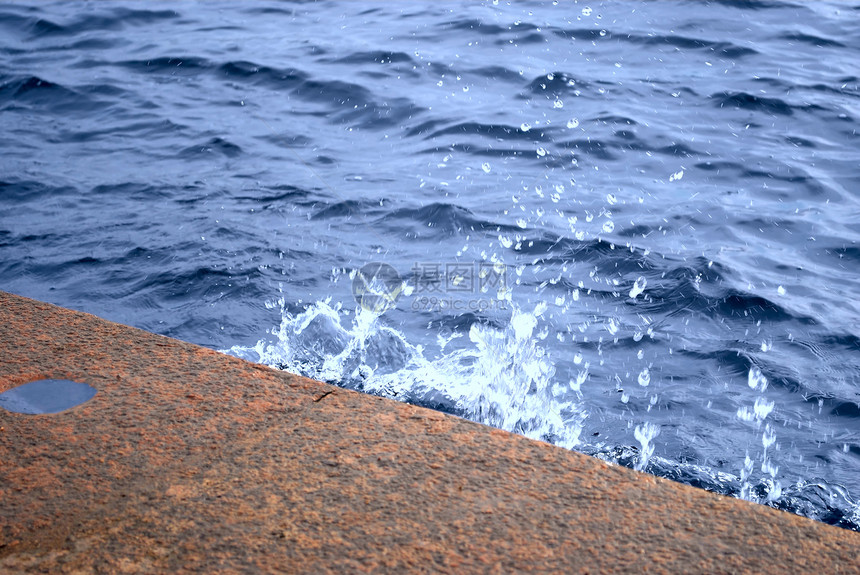 水喷雾码头外滩花岗岩花饰飞溅研磨地表水滴石头图片