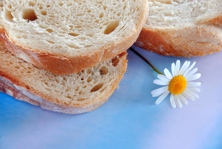 白面包片棕色食物小麦早餐脆皮雏菊黄色面包白色化合物图片