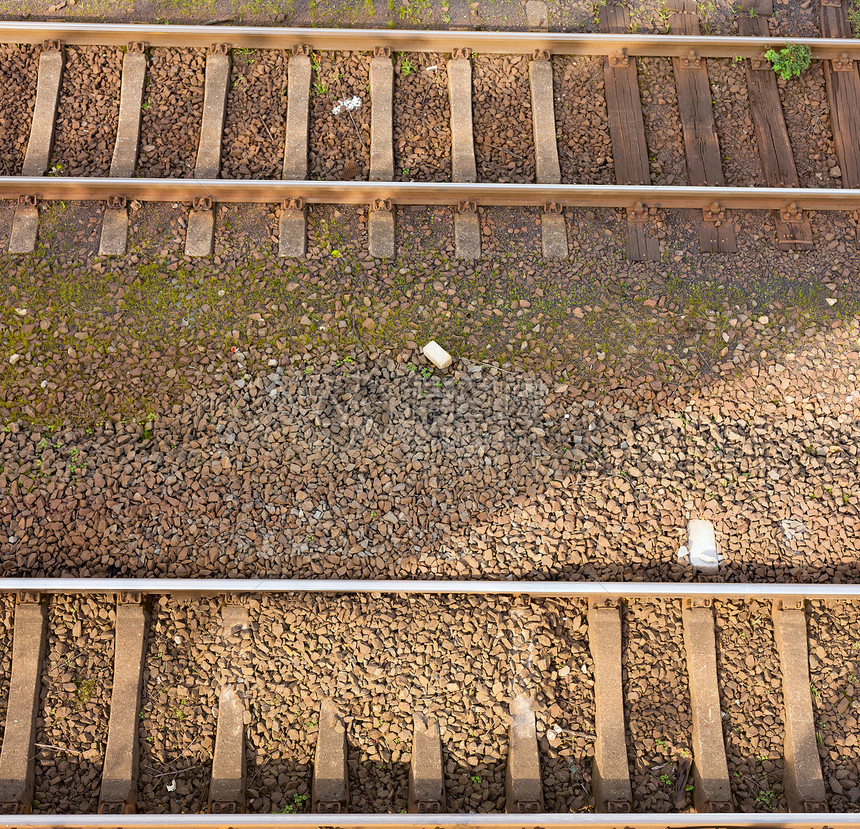 铁路轨道旅行小路货运技术过境碎石航程卵石灰色石头图片