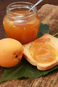甜杏子酱果酱水果黄油小吃橙子果汁早餐食物高清图片
