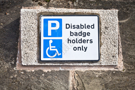 残疾人泊车英语盘子停车位背景图片