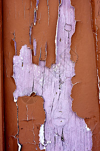 涂有剥皮油漆的木制木质纸棕色条纹建造风化宏观粉色木头裂缝衰变木板背景图片