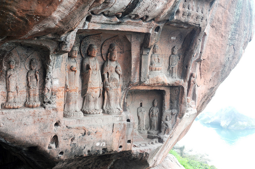 古佛像岩石洞穴寺庙粉色文物废墟雕刻佛教徒石头雕像图片