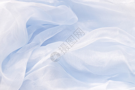 蓝沙子纺织品衣服折叠蓝色天鹅绒曲线涟漪海浪背景图片