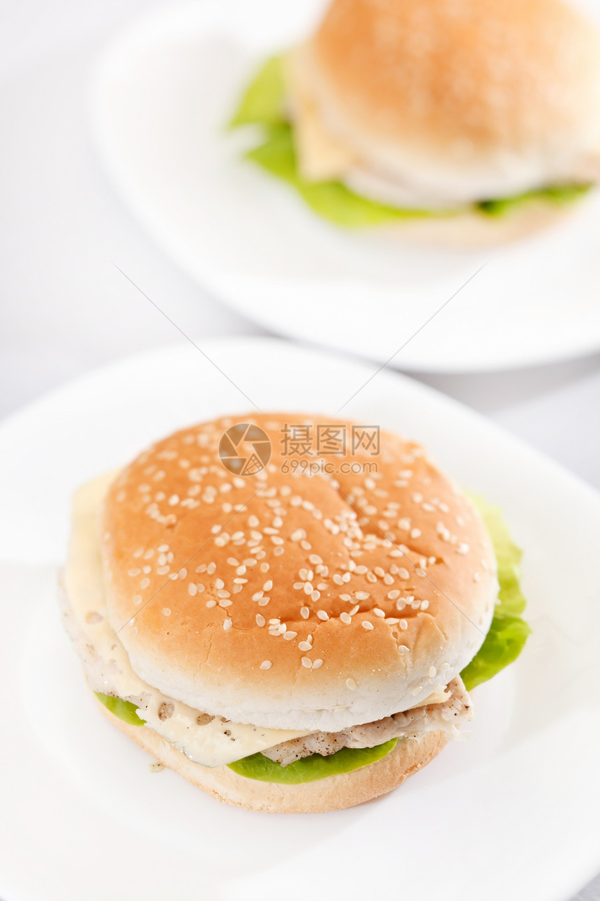 鸡肉三明治食物包子小吃盘子派对洋葱面包芝麻图片