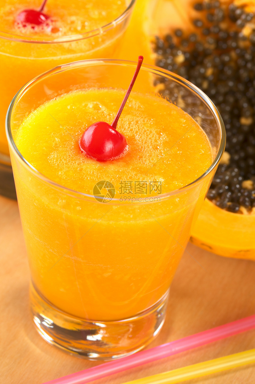 木瓜果汁饮料黄色摄影玻璃水果食物红色图片