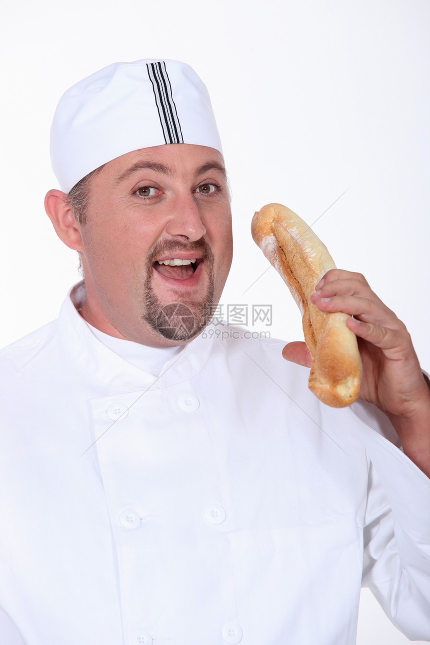 穿在面包店的胖子正在吃面包图片