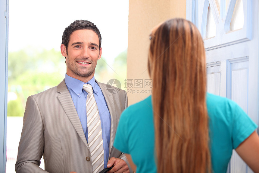 销售员套装男人胡须领带天气顾客金发女郎蓝色微笑脖子图片