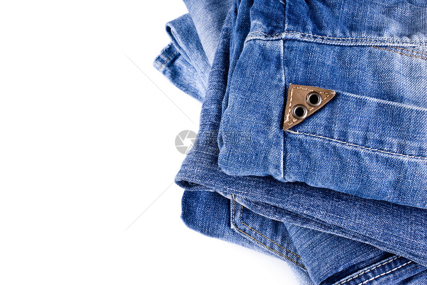 蓝色牛仔裤牛仔布服装折叠角落阴影外套铆钉接缝休闲裤口袋图片