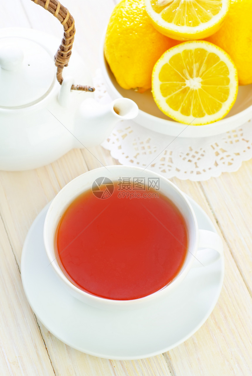 新鲜茶茶陶器柠檬饮料兴奋剂芳香黏土竹子树叶飞碟早餐图片