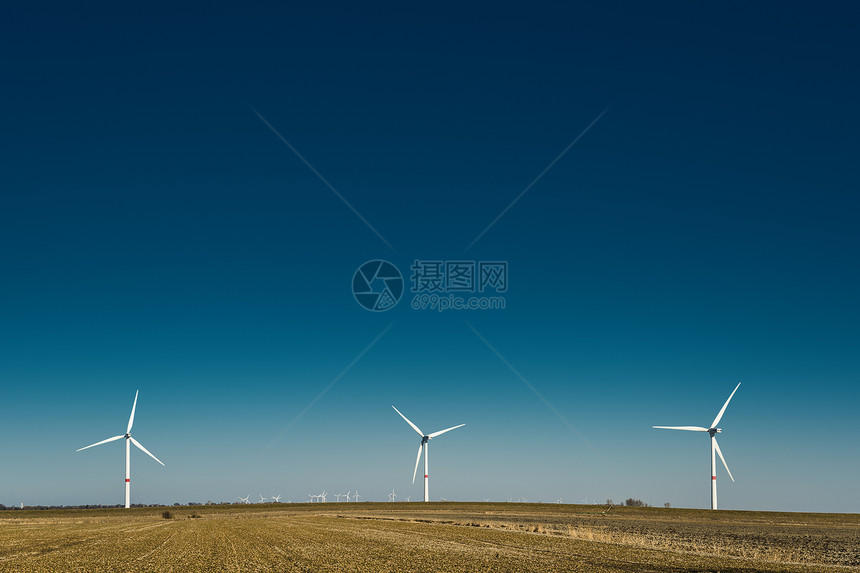 德国北部的风车生产农场公园场地工业活力发电机涡轮力量生态图片