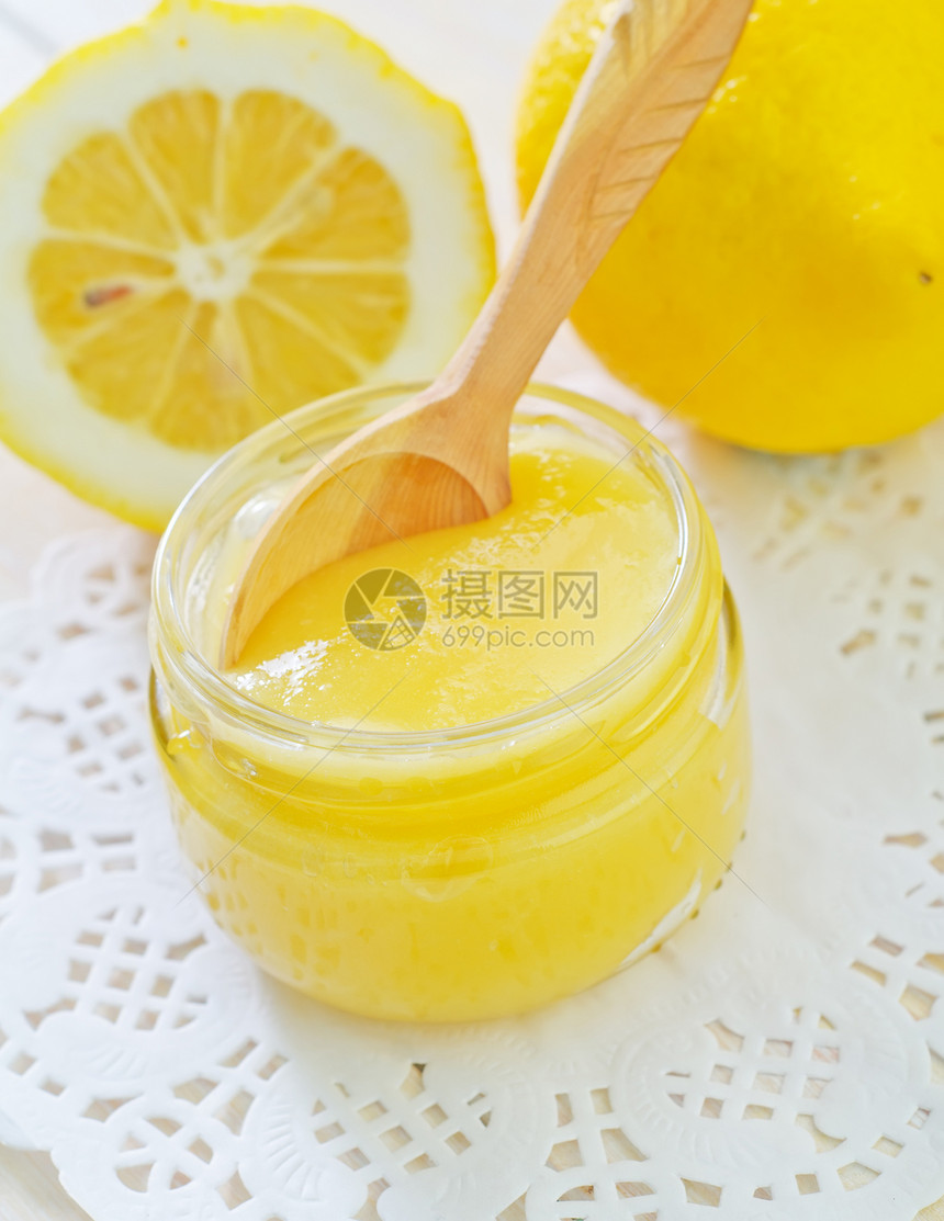 蜂蜜和柠檬液体营养宏观水果琥珀色蜂蜜植物木头玻璃小麦图片