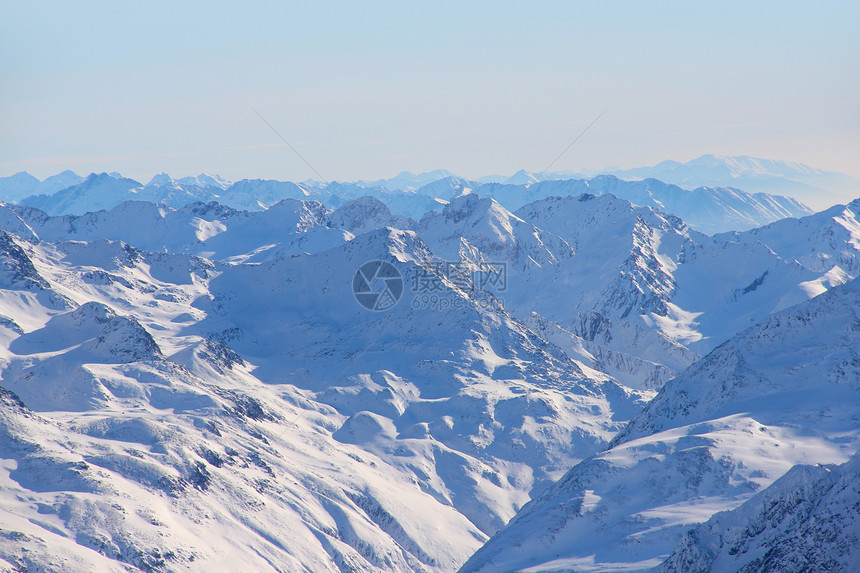 山山脉蓝色粉末冒险运动环境闲暇气候顶峰旅游岩石图片