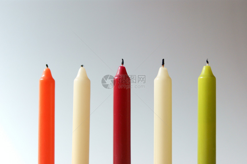 蜡烛黄色宏观橙子红色黑色温暖火焰纪念图片