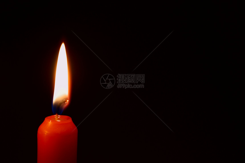 燃烧红蜡烛黄色红色宏观温暖纪念橙子黑色火焰图片