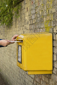 邮箱送货信箱信封石头黄色邮政背景图片
