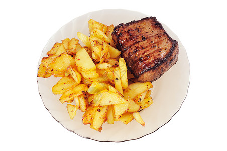 一块盘子上的灰肉和炸土豆薯条土豆晚餐烧烤食物油炸牛扒背景图片