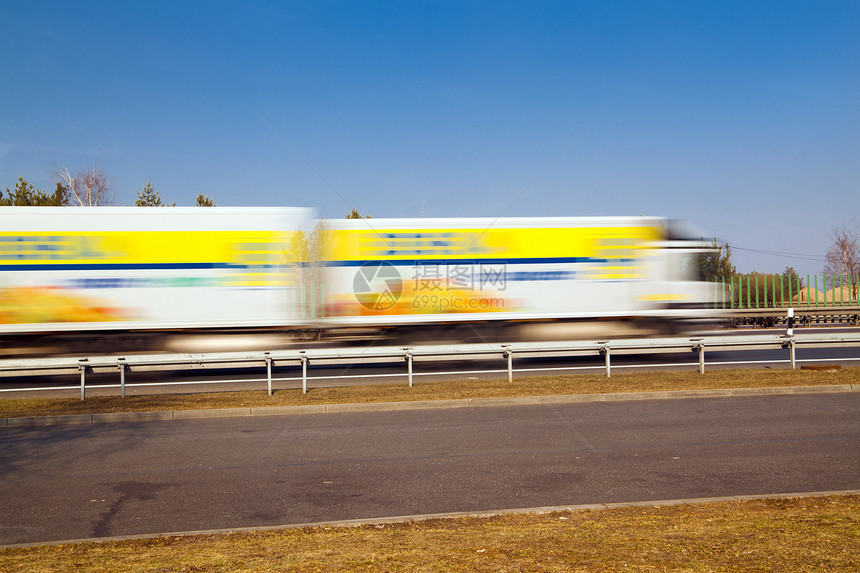 过路卡车货车送货蓝色交通运输旅行摄影路线速度运动图片