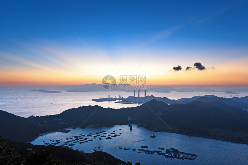 香港Lamma岛海岸线爬坡村庄海洋蓝色橙子日落车站力量钓鱼图片