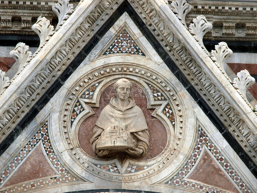 Duomo外表的建筑细节 锡耶纳圣母艺术拱形窗饰建筑学雕塑大理石门户网站大教堂窗户图片