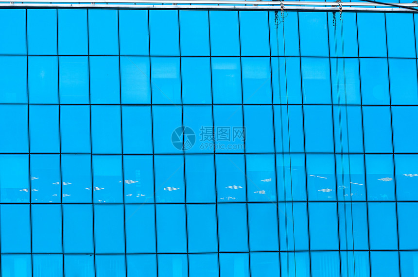 有反射的蓝窗口商业窗户房子工作建筑酒店办公室玻璃蓝色镜子图片
