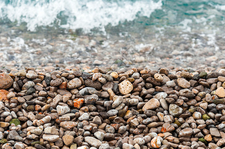 海上的冰石公园石头卵石墙纸支撑温泉材料海岸鹅卵石岩石背景图片