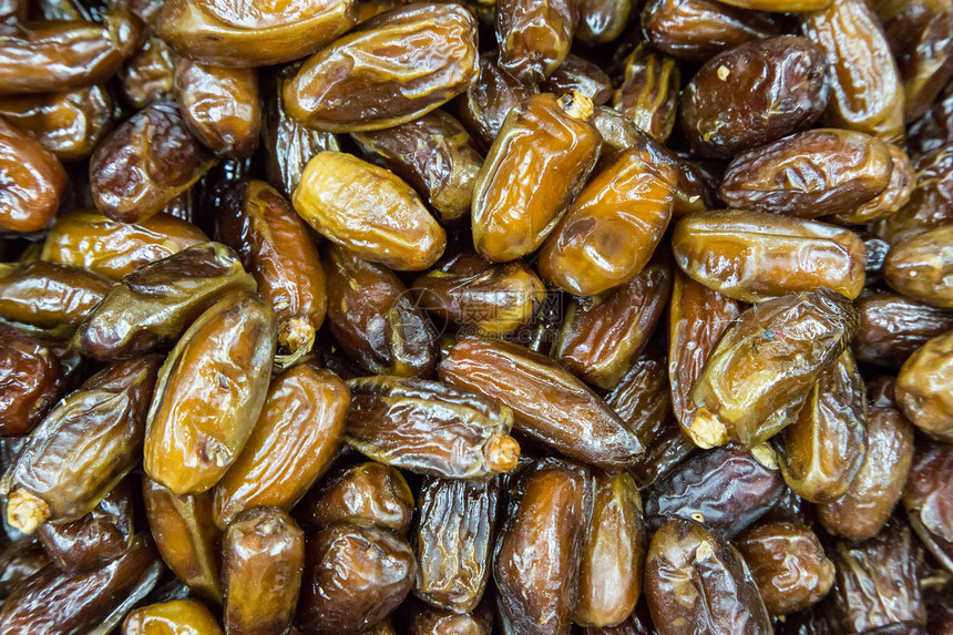 迪拜街头商店的约会日期团体玉米饮食坚果小吃营养店铺味道旅行游客图片
