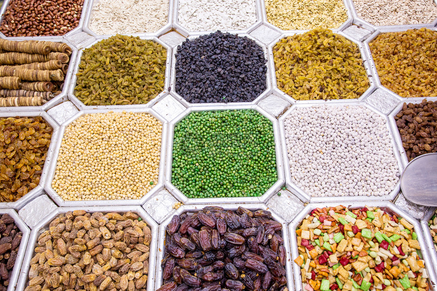 迪拜市场的干果和坚果混合商业食物饮食旅行花生开心果味道店铺游客街道图片