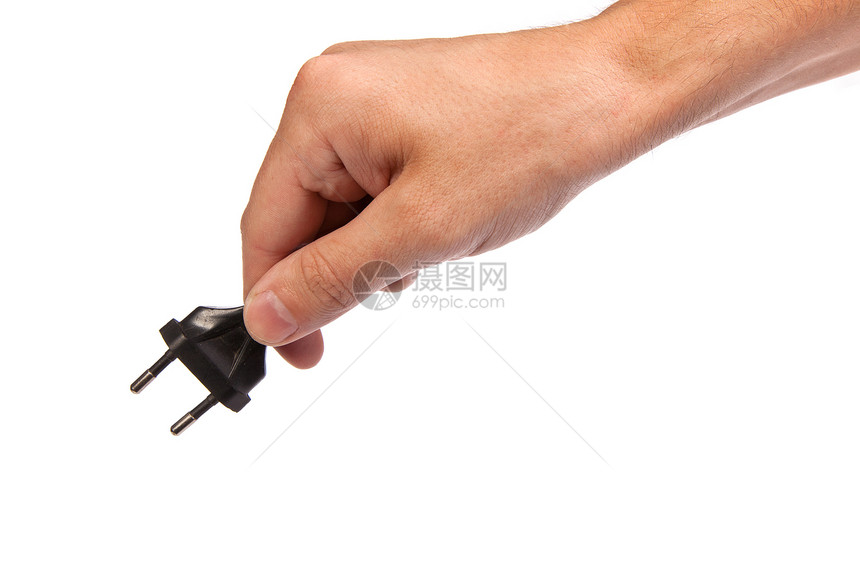 人手里握着一个黑门口插头男性手指塑料金属电气绳索插座技术力量图片