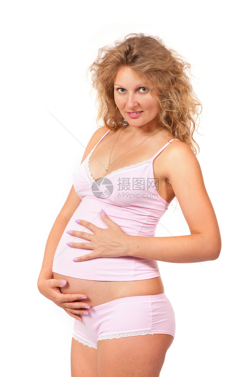 孕妇在抚摸她的肚子生活婴儿白色情感身体父母女士妈妈女孩分娩图片