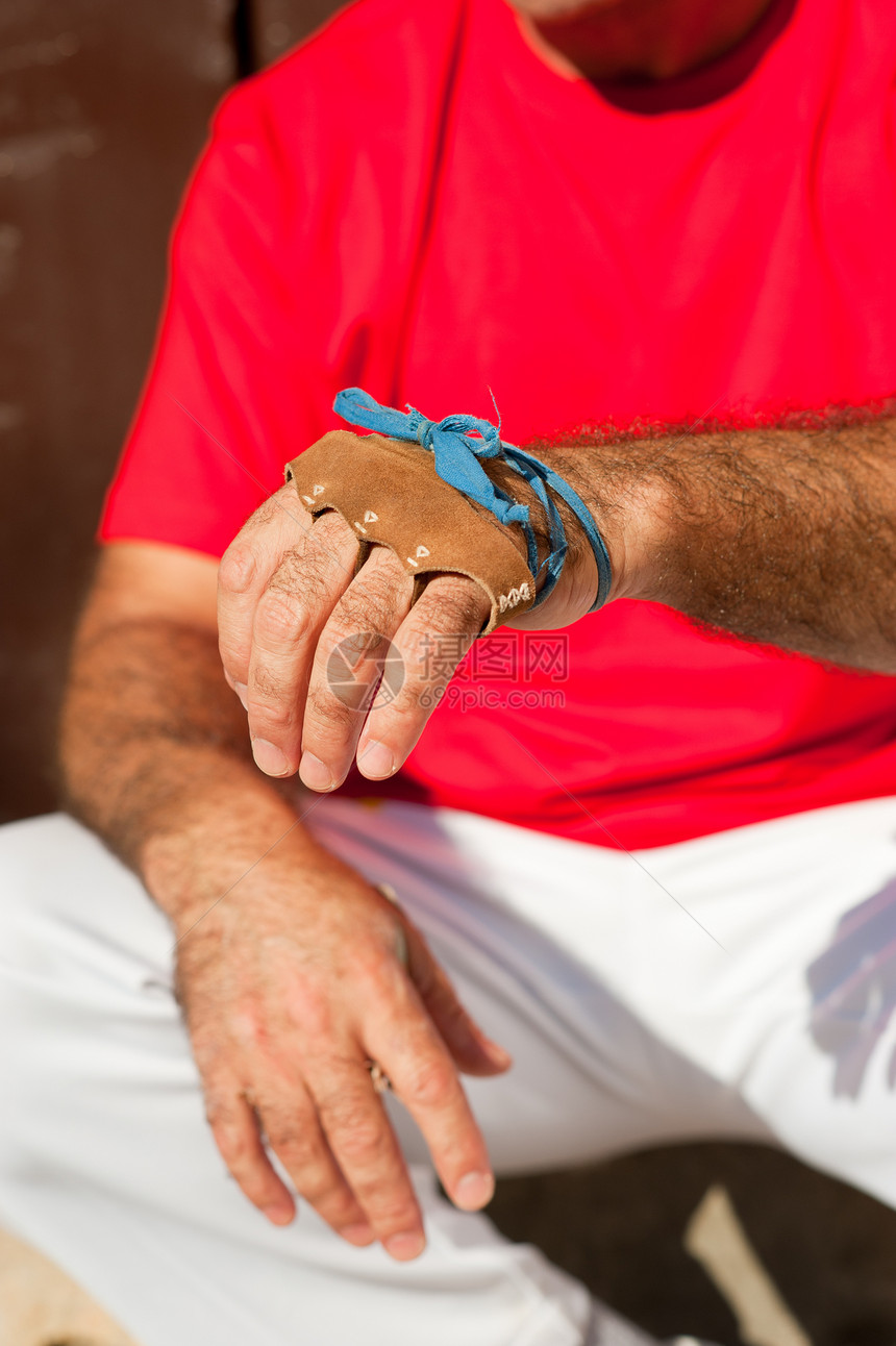 Pelota 播放器玩家男人男性运动员游戏传统运动水平皮革手工手套图片