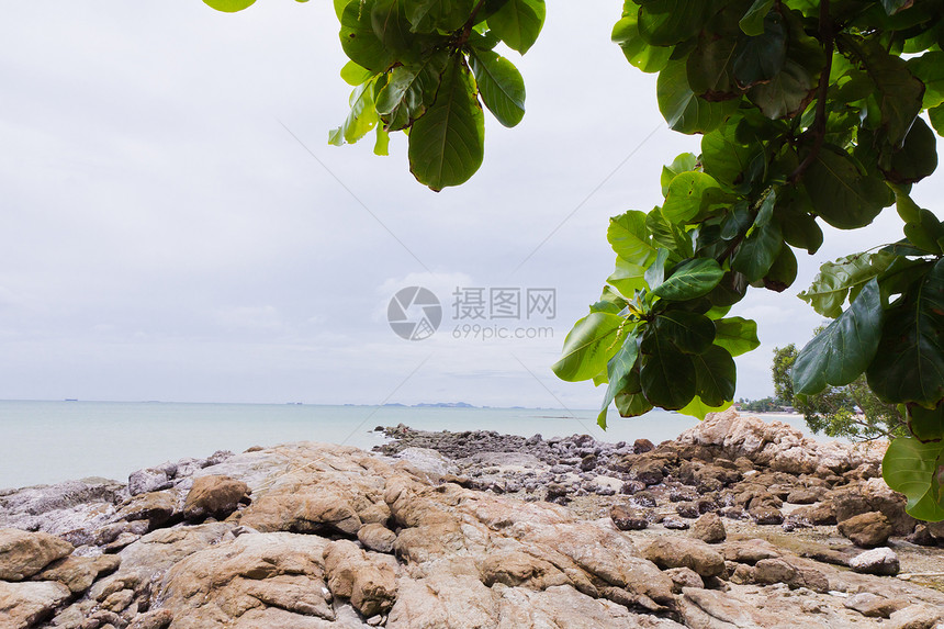 海边的落基海滩正方形日出地平线石头蓝色太阳旅行海浪野生动物荒野图片