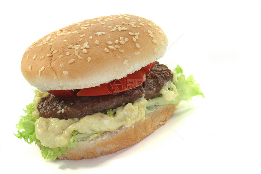 带新鲜蔬菜的汉堡包洋葱增肥碎肉芝麻包子饮食享受食物零食图片