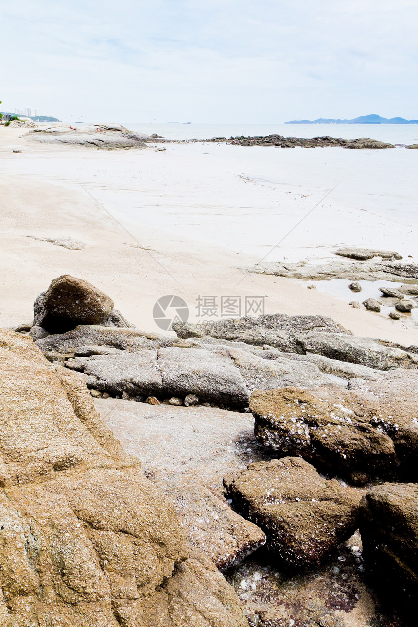 海滩 岩石地区和海洋海岸蓝色正方形海景风景野生动物阳光日出日落荒野图片