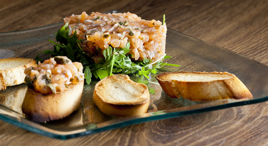 撒旦鲑鱼美食静物盘子食物营养火箭鞑靼糕点面包图片