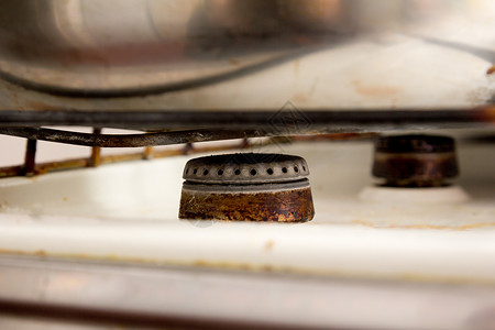 元始天尊煤气炊具上的旧烧炉厨具火炉金属青铜煤油古董厨房历史腐蚀汽油背景