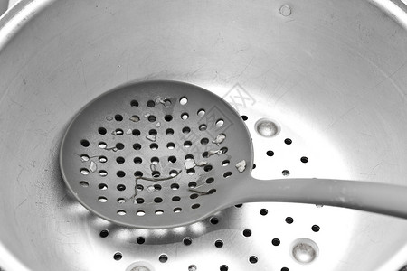 厨房设备勺子圆圈滤器乐器厨师背景图片