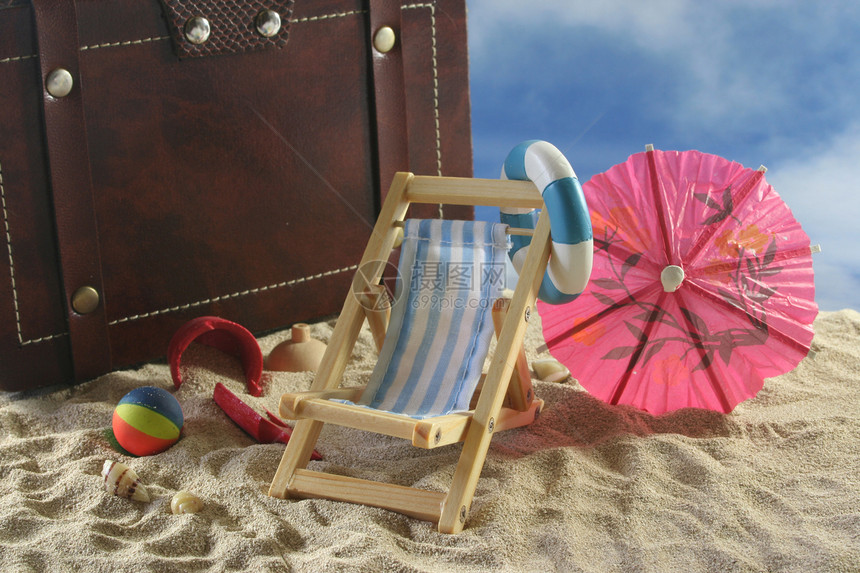 度假旅行椅子天空海滩太阳椅木椅手提箱水球谎言游泳娱乐图片