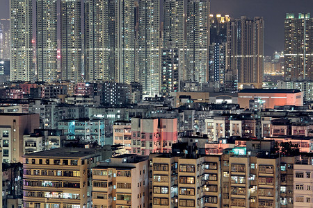市区深夜地标建筑学办公室中心建筑物摩天大楼城市天际背景图片