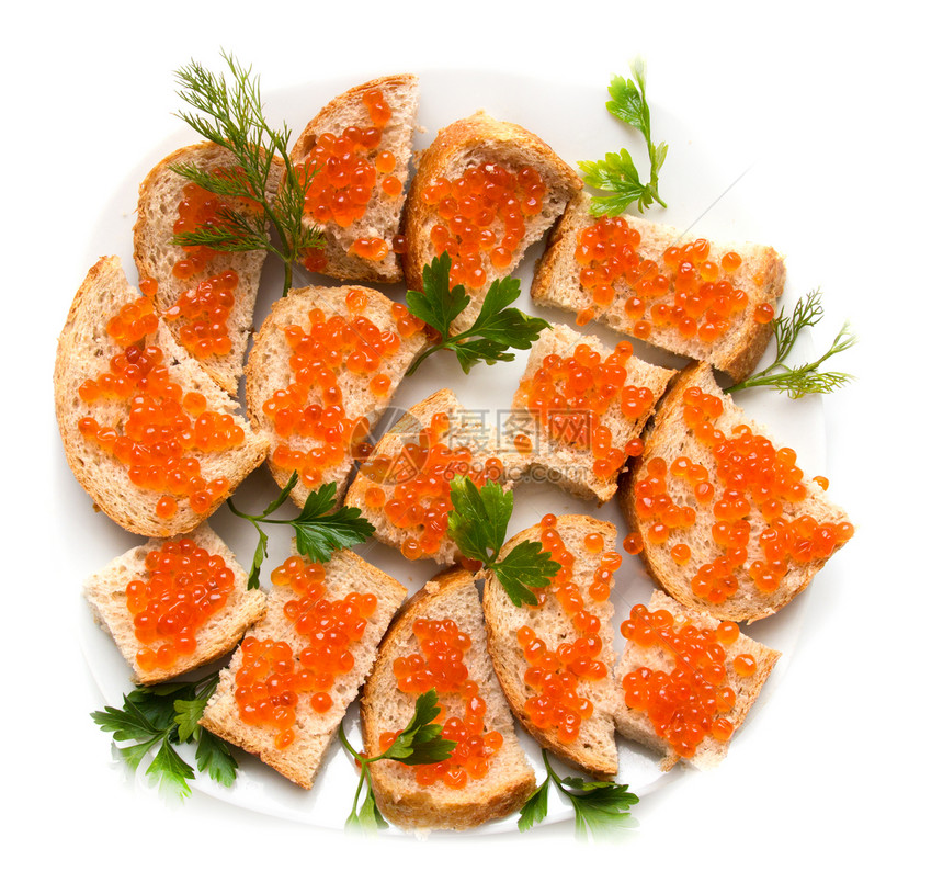 面包上红鱼子酱和卷饼叶子小吃盐渍海鲜食物橙子奶油美食熟食黄油图片