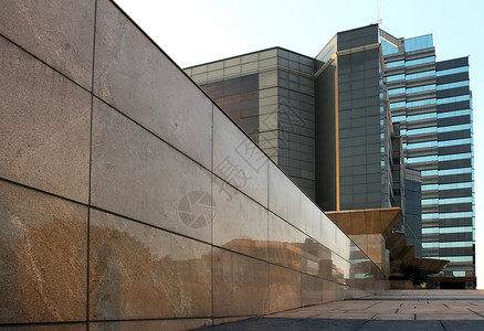 办公大楼花岗岩商业贸易蓝色建筑城市办公室棕色建筑学玻璃背景图片