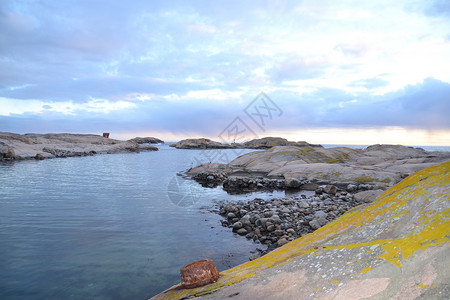 埃兹维卡纳伦灰石棉日落花岗岩波浪保护区灯塔岩石背景