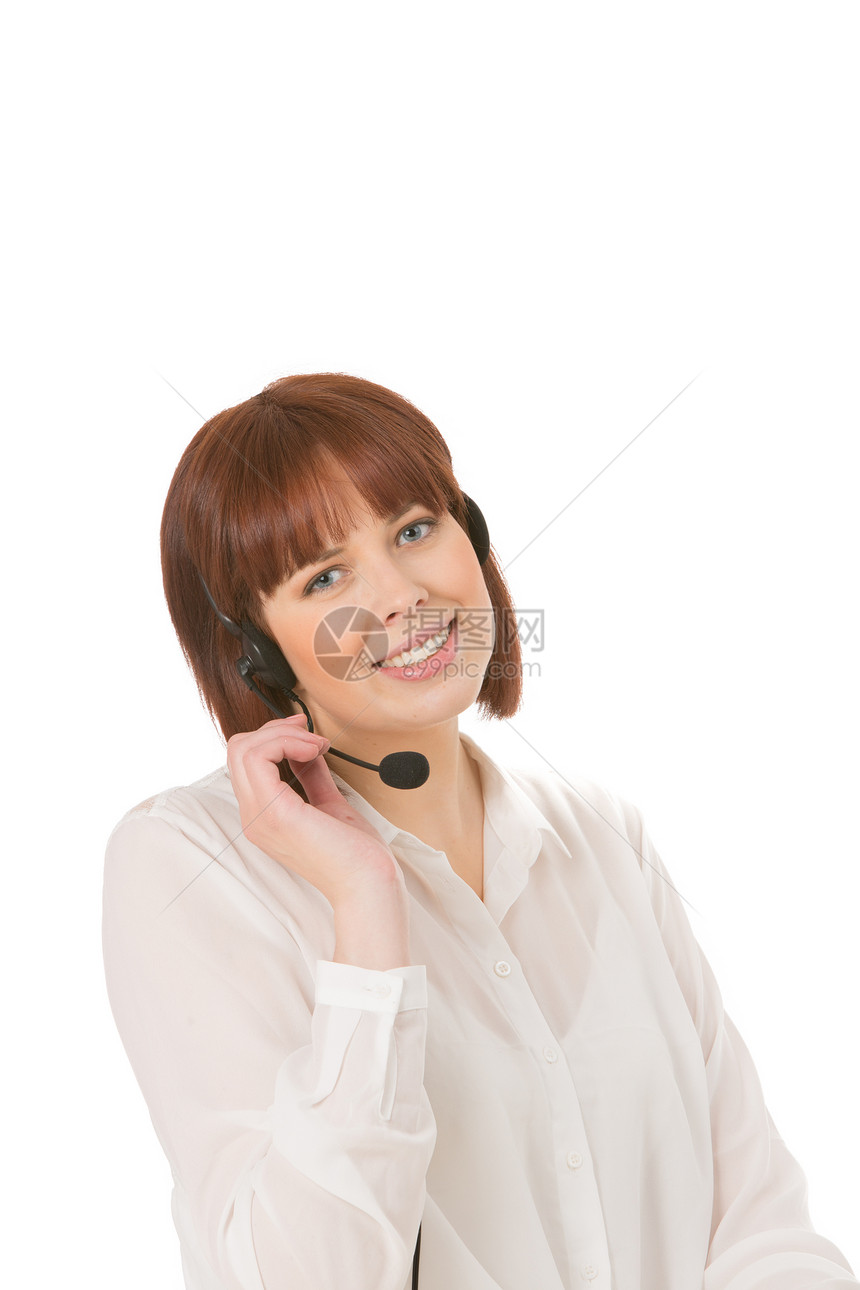 微笑的女人用耳机说话图片