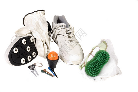 高尔夫球场拉拔器尖刺白色手套配件运动鞋带分区橙子猎犬背景图片