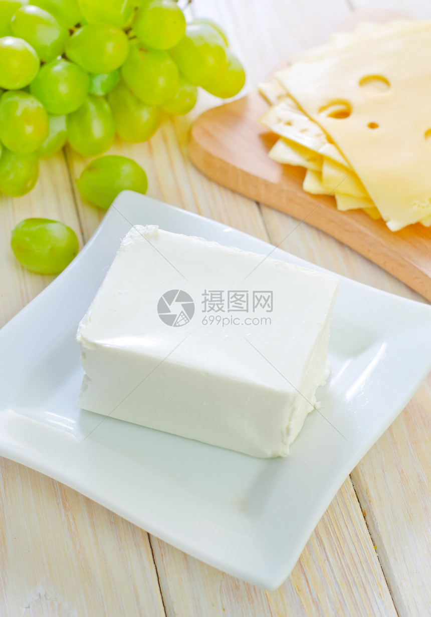 白奶酪午餐烹饪柔软度健康乳酪立方体蔬菜洋葱投标盘子图片