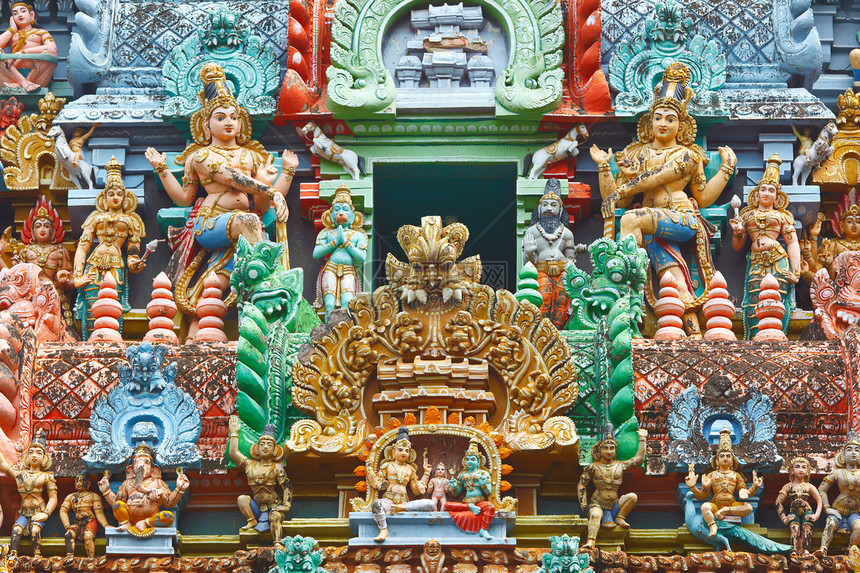 印度寺庙塔上的雕塑雕像建筑学寺庙神庙上帝石头装饰图片