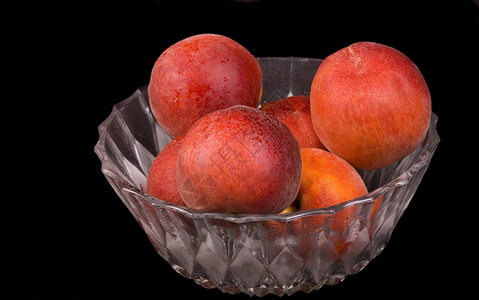 桃子碗膳食营养皮肤飞沫红色黑色维生素美味甜点水果高清图片