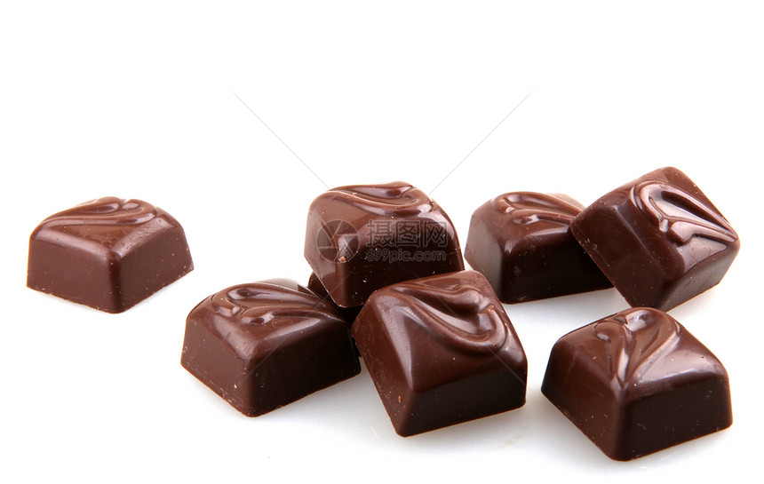 白色背景的堆叠巧克力糖果Name股票刨花图片烘焙原料摄影食物库存照片甜点图片